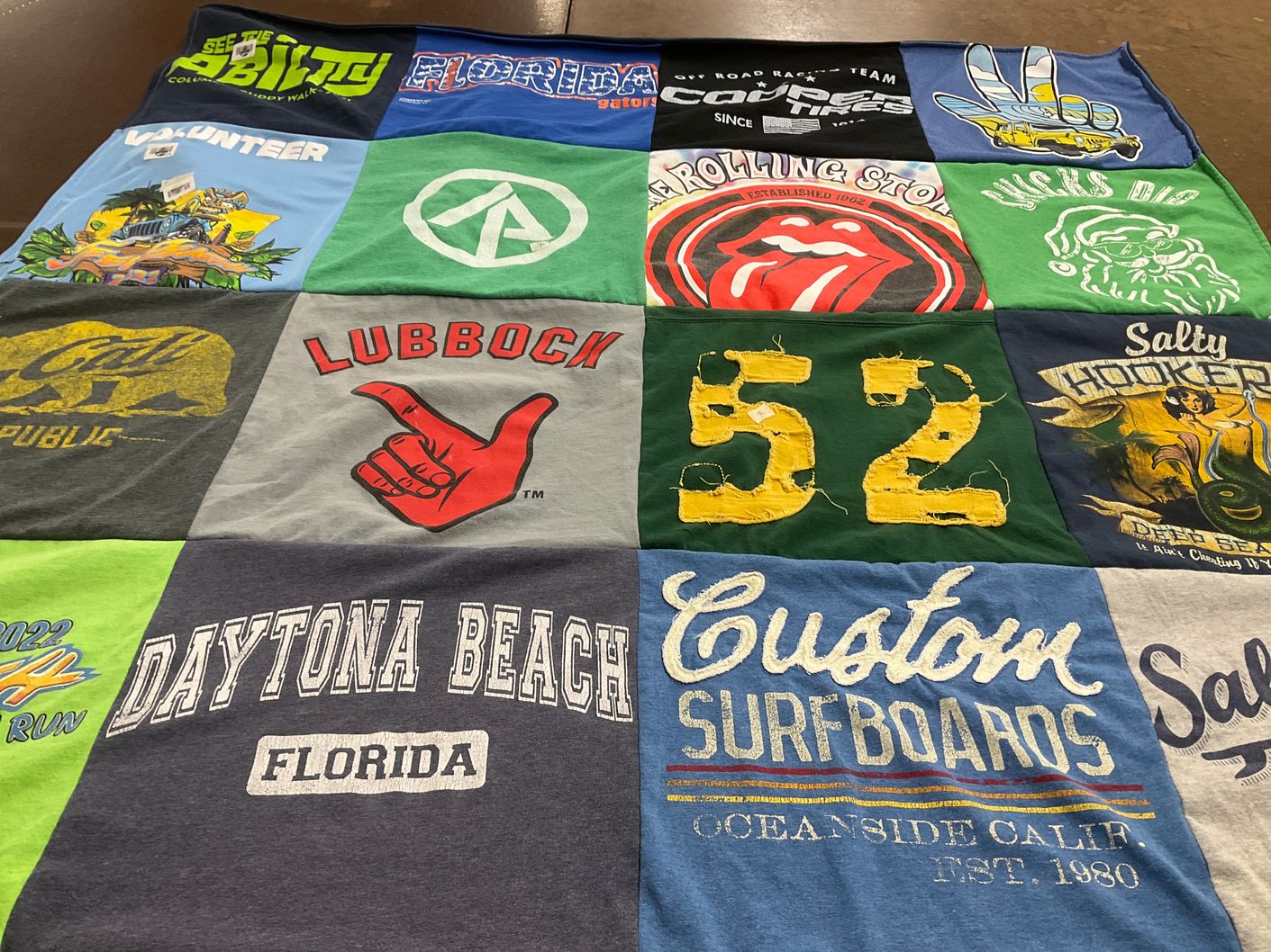 T-shirt quilt with surfing, beach activities themes by Sandy from OH
