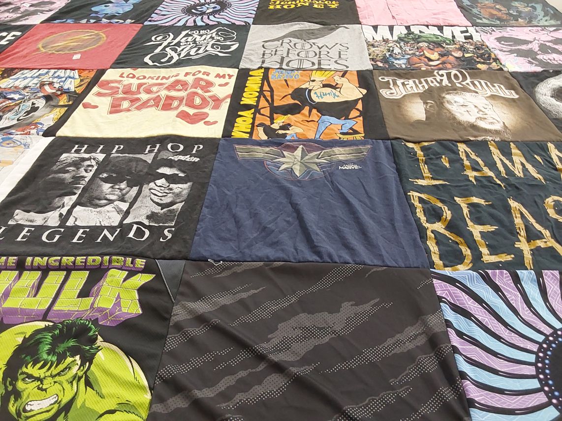 T-shirt quilt with comics, hip hop themes by Kimberly from NC