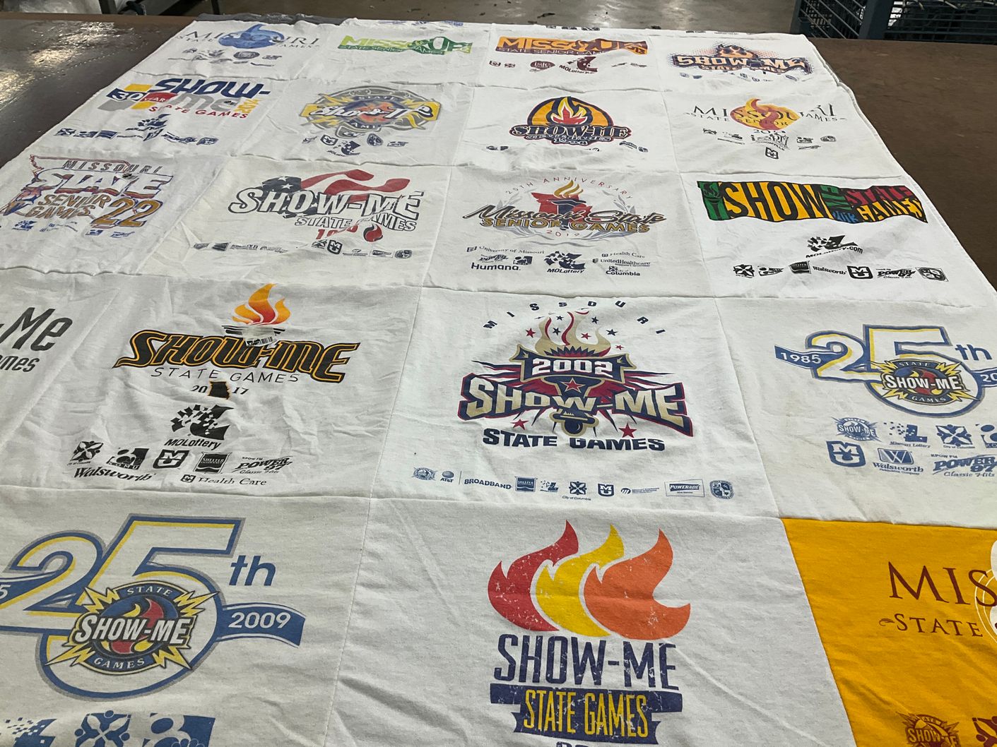 T-shirt quilt with sports, games themes by Cindy from MO