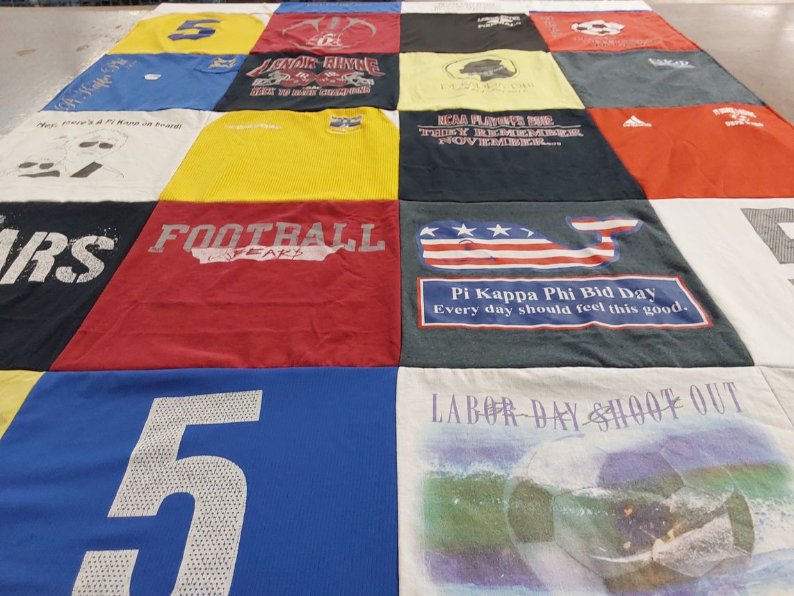 T-shirt quilt with sports, fraternities themes by Gloria from MD