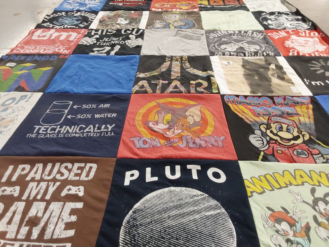 T-shirt quilt with video games, cartoons themes by Jennifer from FL