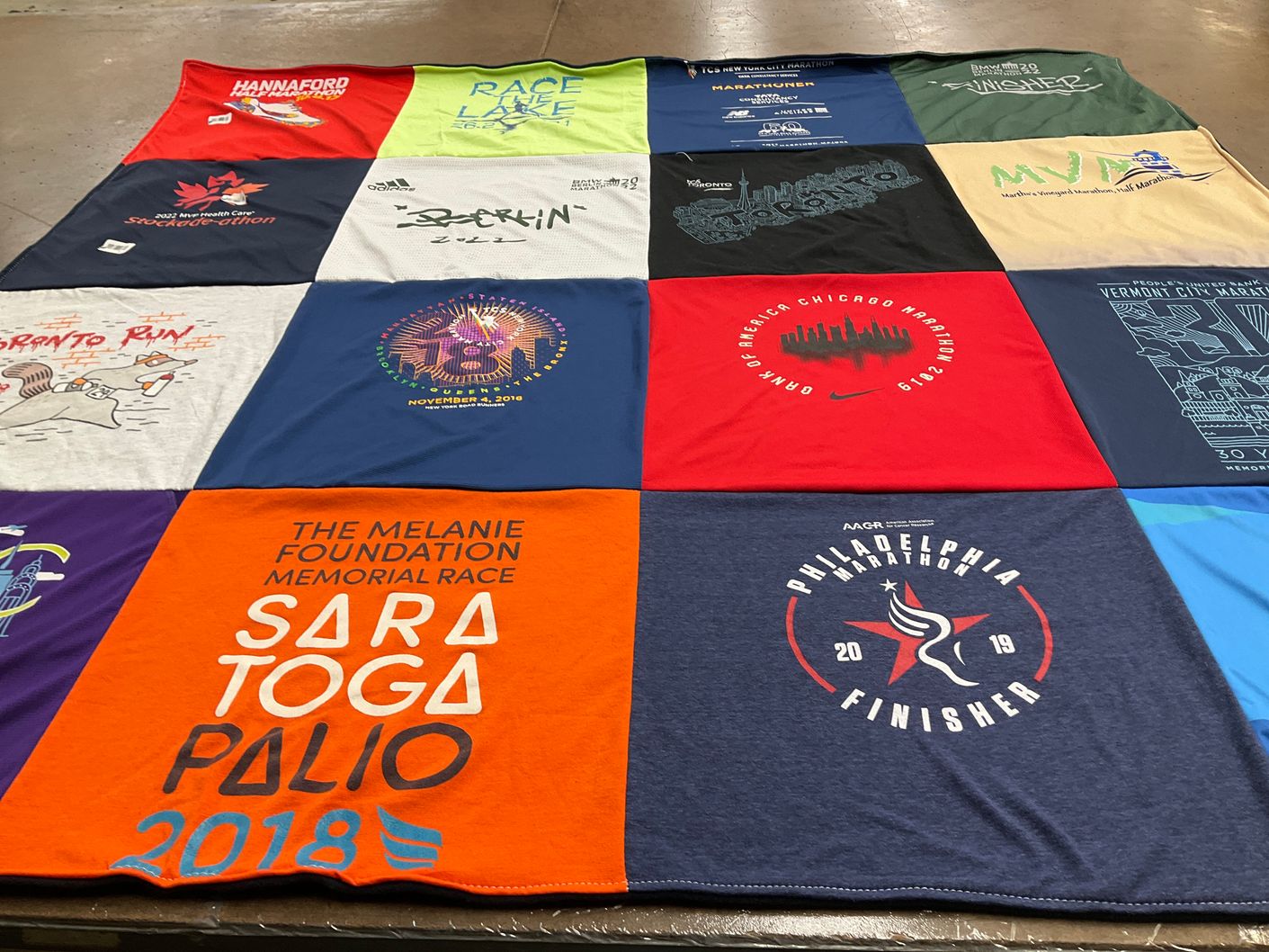 T-shirt quilt with running, marathons themes by Beth from NY