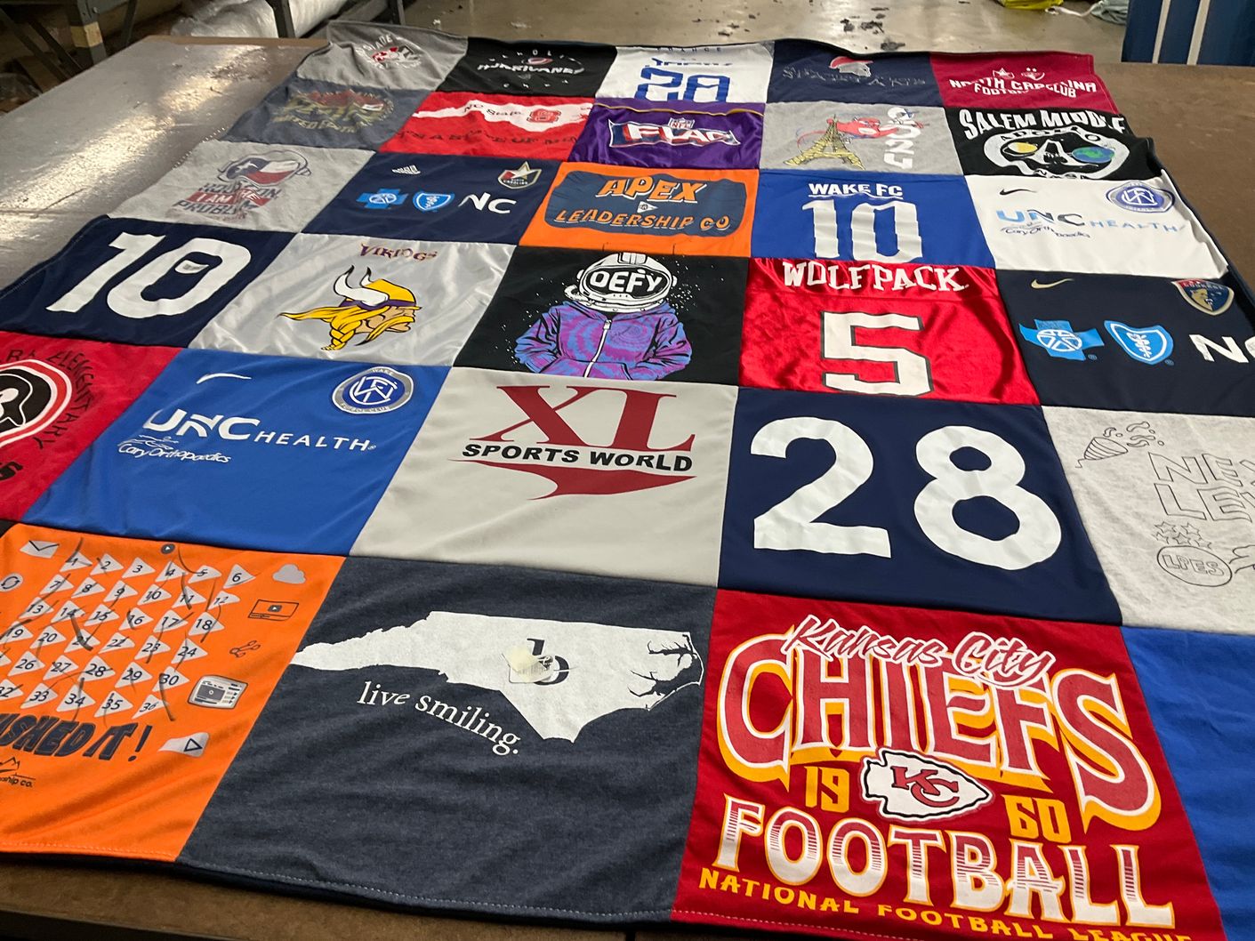 T-shirt quilt featuring kansas city chiefs football by Anne-Claude from NC