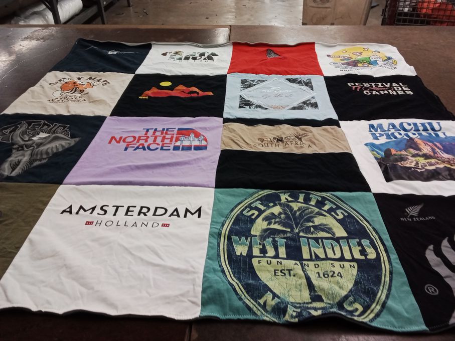T-shirt quilt with travel, outdoors themes by Emily from TX
