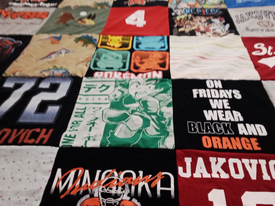 T-shirt quilt with collecting, sports themes by Laura from IL