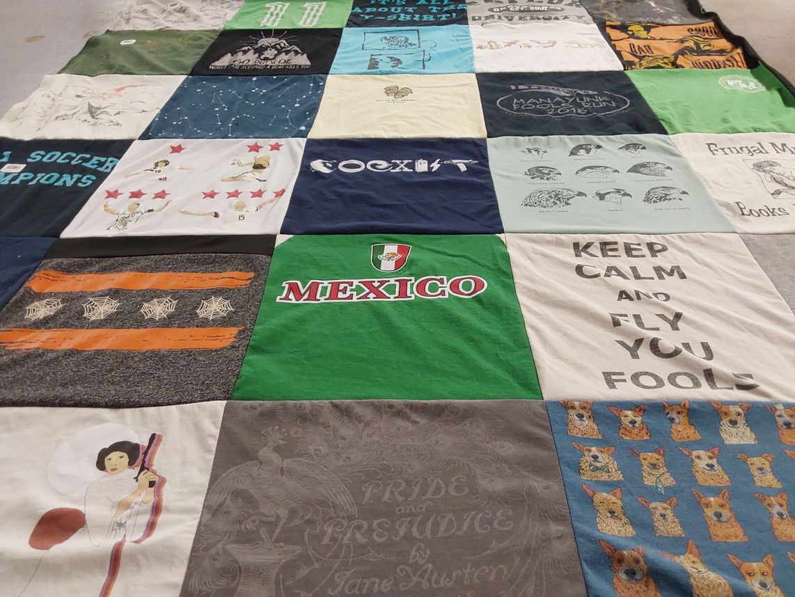 T-shirt quilt with soccer, literature themes by Jess from IL