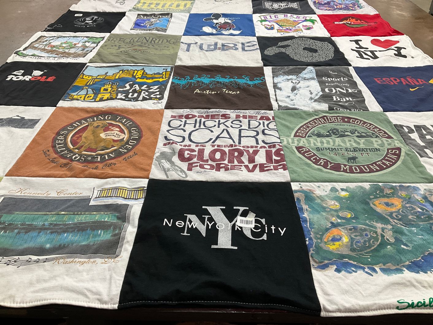 T-shirt quilt with travel, music themes by Marcia from TX
