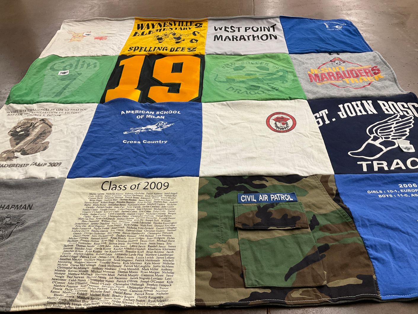 T-shirt quilt featuring st john bosco high school track, waynesville elementary school by Deidre from CA