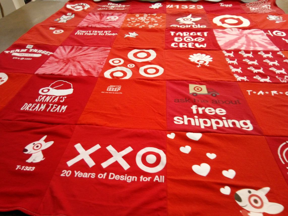 T-shirt quilt with shopping, retail themes by Kimberly from IL