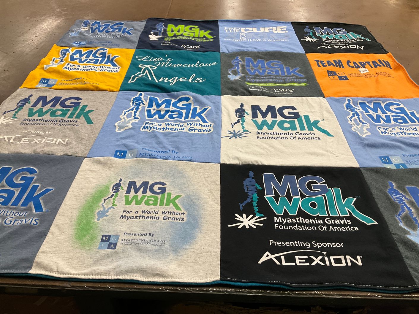 T-shirt quilt with health awareness, myasthenia gravis research themes by Tara from NY