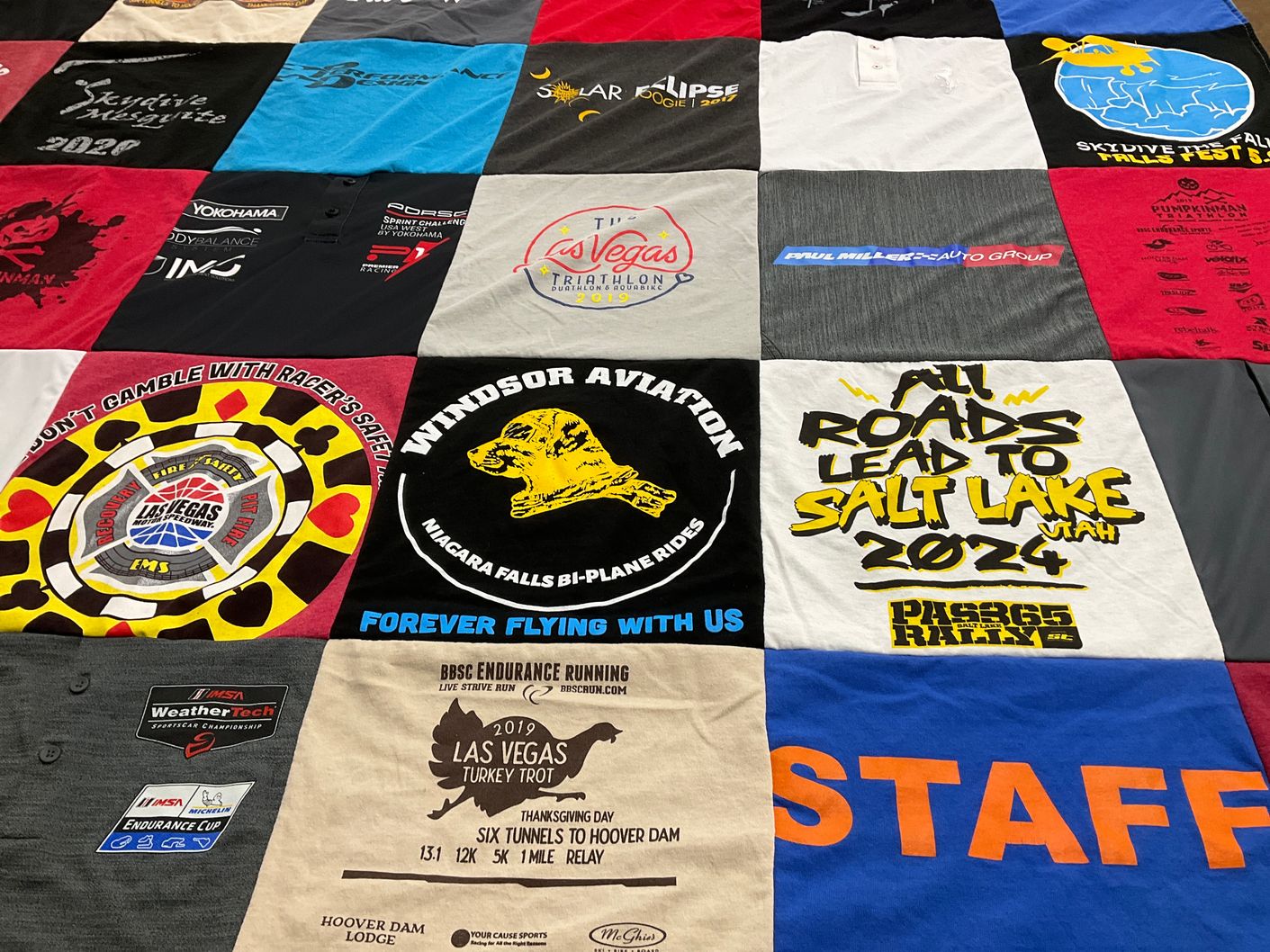 T-shirt quilt with running, skydive themes by Matt from NV