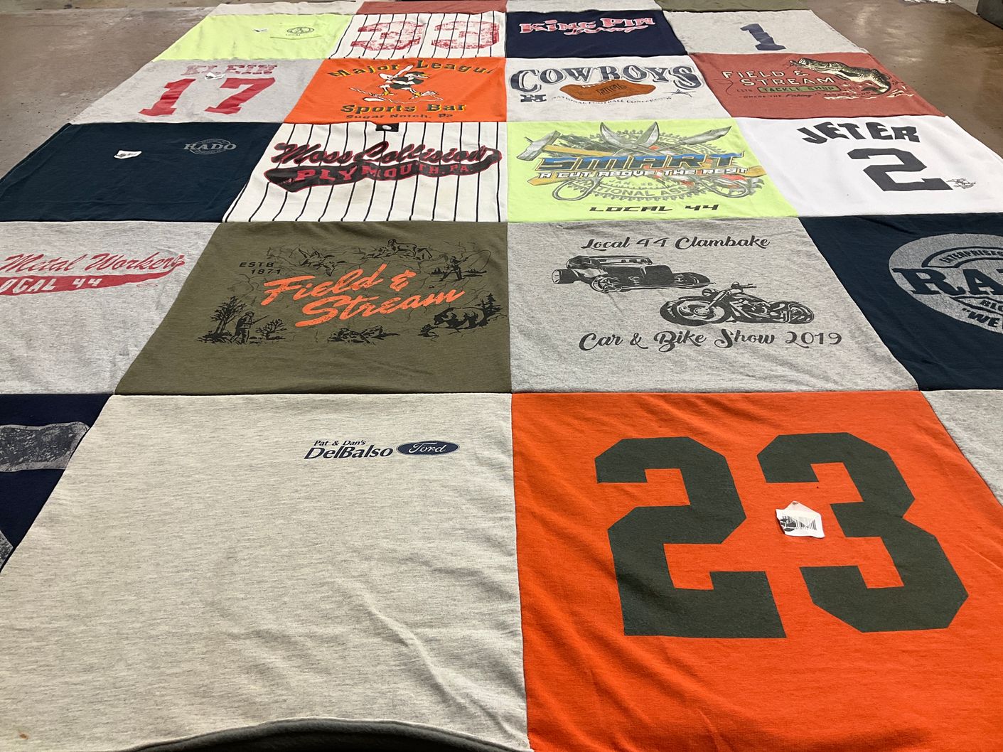 T-shirt quilt with hunting, fishing themes by Carolyn Klein from PA