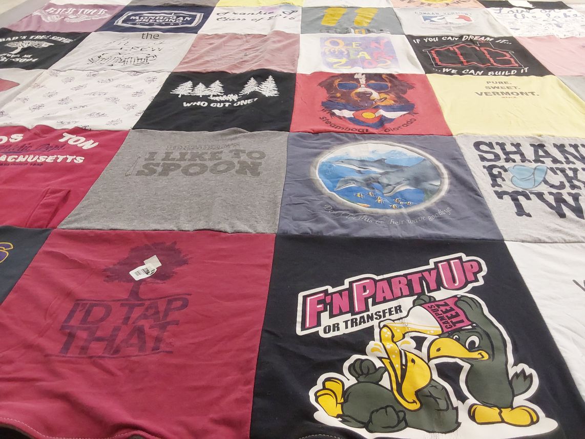 T-shirt quilt with travel, humor themes by Courtney from VT