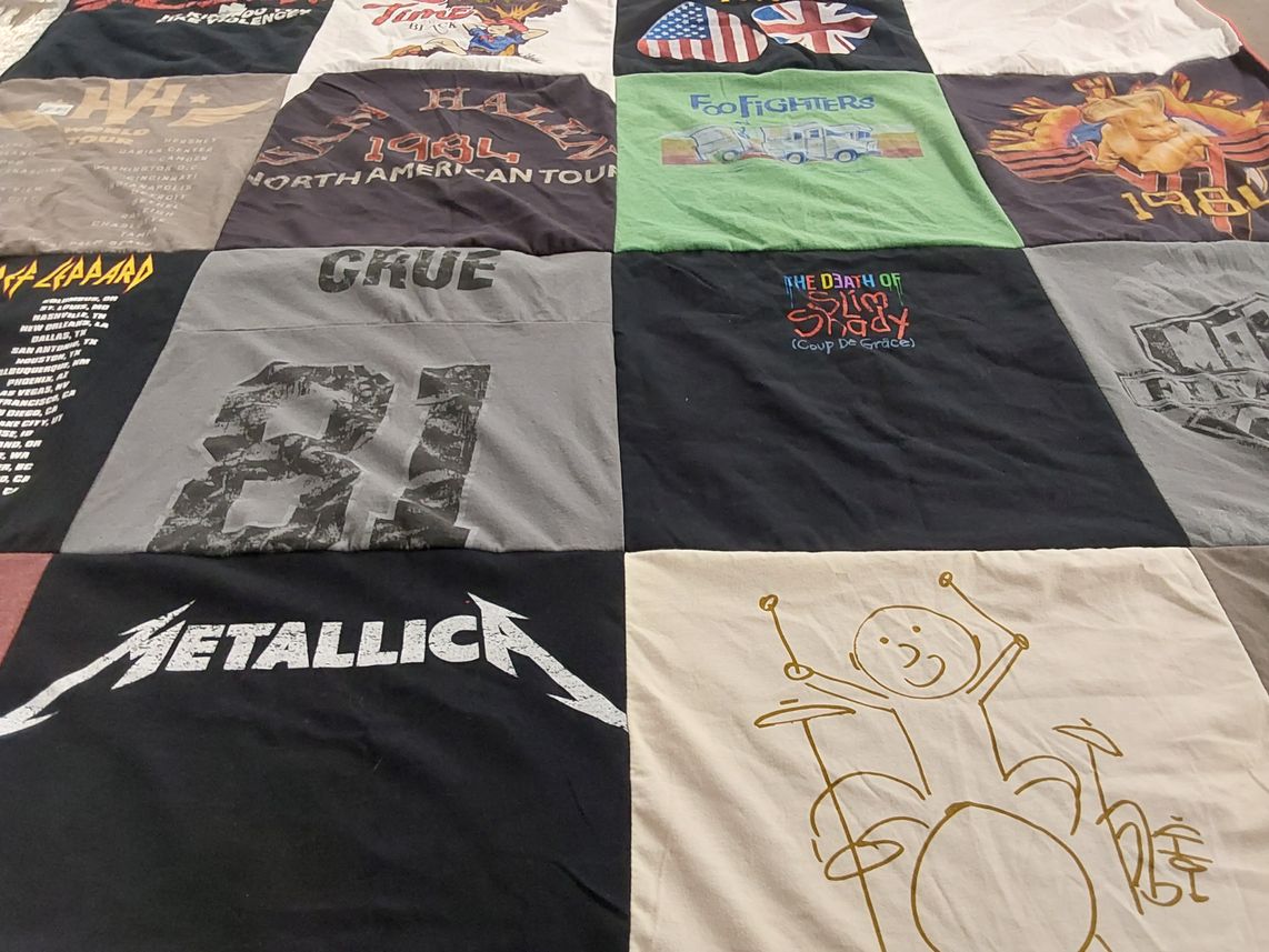 T-shirt quilt with music, bands themes by Jennifer from TX