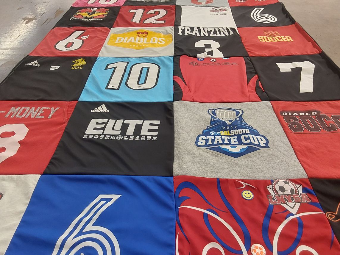T-shirt quilt with soccer themes by Stacy from CA