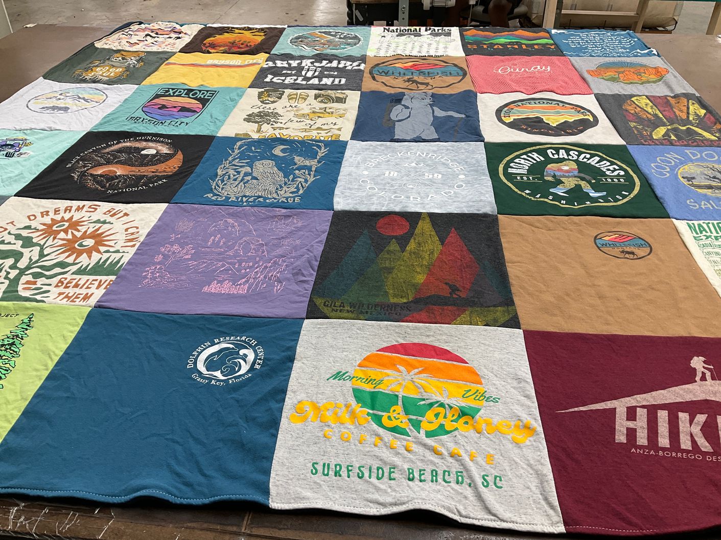 T-shirt quilt with hiking, outdoors themes by Anna from OH