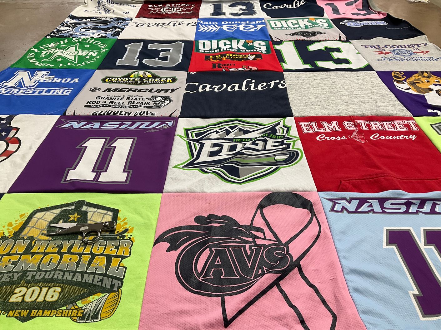 T-shirt quilt featuring nashua high school wrestling, elm street cross country by Amy from NH