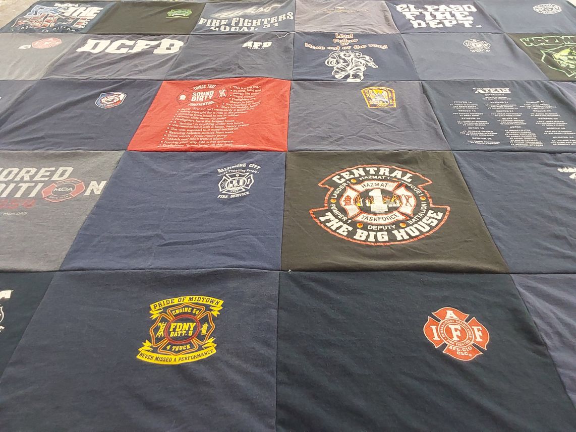 T-shirt quilt with firefighting, emergency services themes by Tina from TX