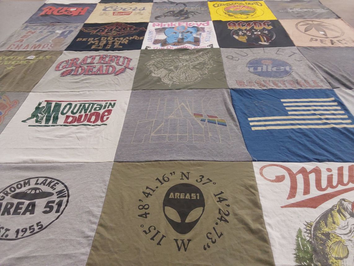 T-shirt quilt with music, sports themes by Marci from MD