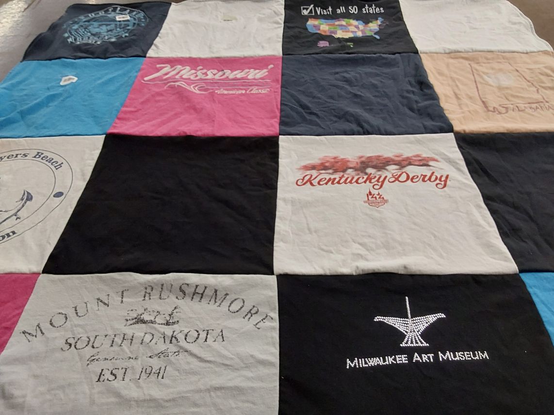 T-shirt quilt with travel, arts themes by Nancy from FL