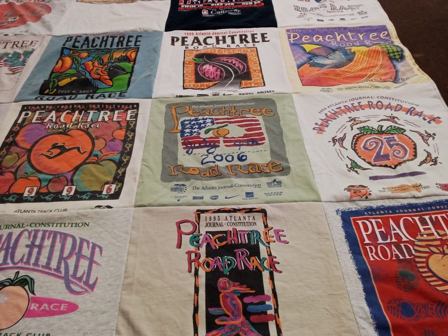 T-shirt quilt with running, events themes by Robert from FL