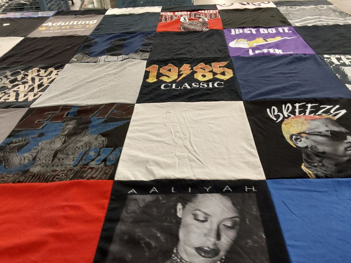 T-shirt quilt with music, pop culture themes by Dominique from MD