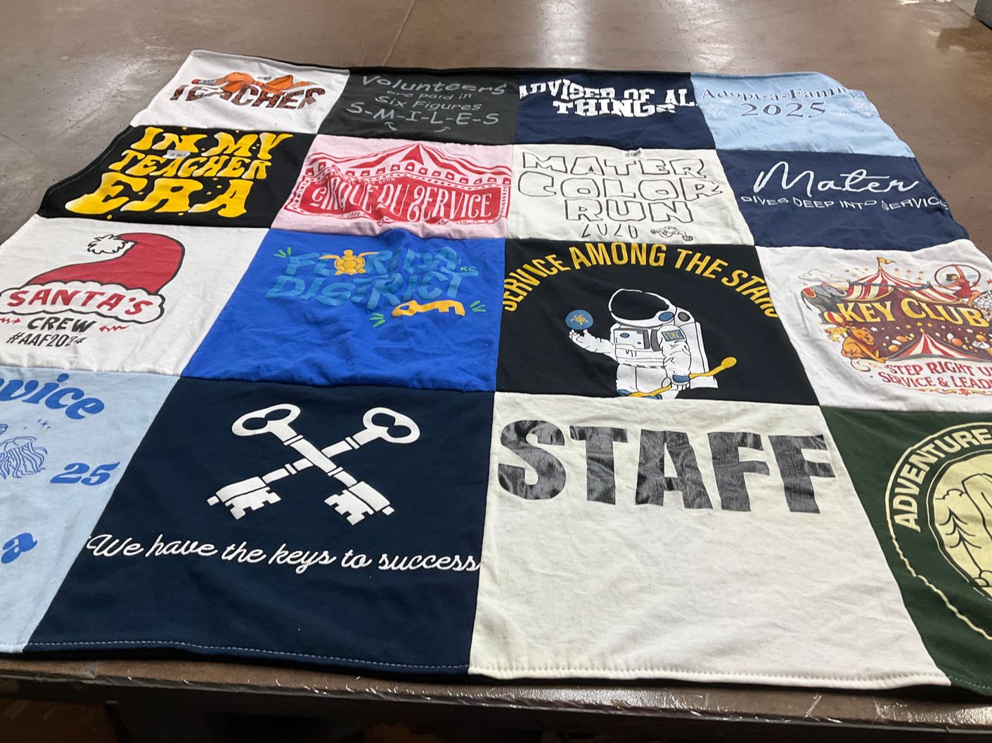 T-shirt quilt with education, community service themes by Cristina from FL