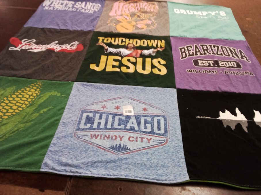 T-shirt quilt with travel, sports themes by Jody from NM