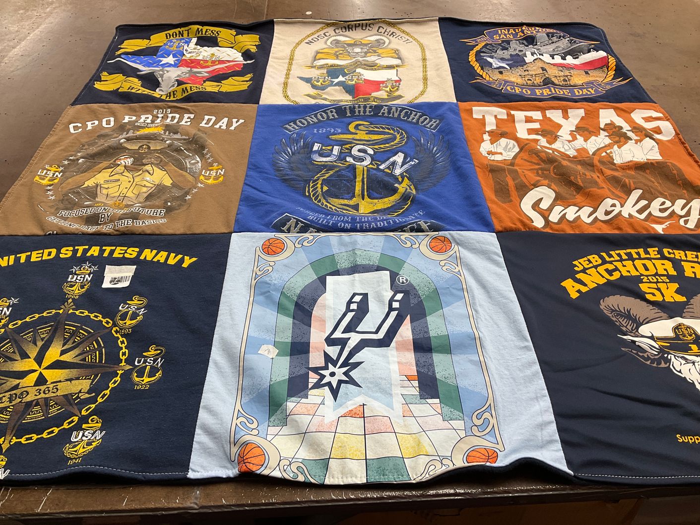 T-shirt quilt with navy, sports themes by Jesse from TX