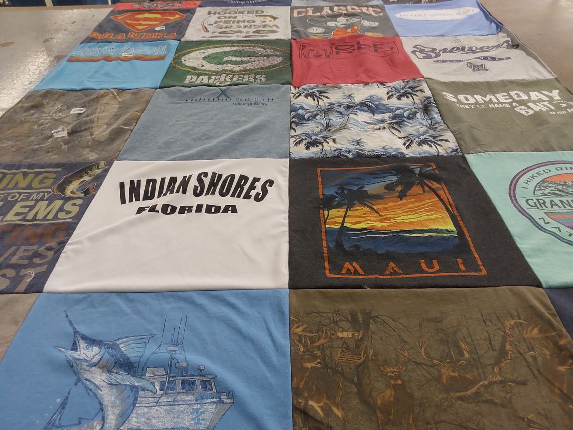 T-shirt quilt with travel, fishing themes by Deborah from WI