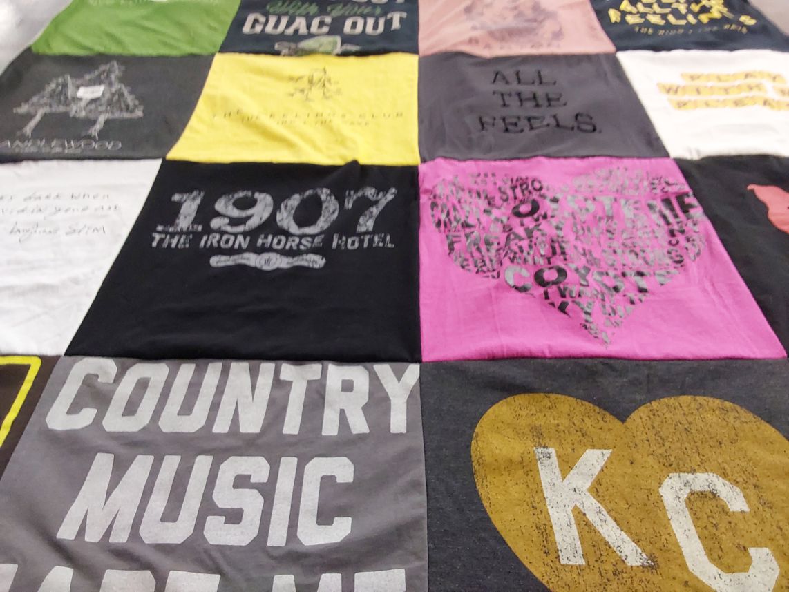 T-shirt quilt with music, hotels themes by Katherine from WI