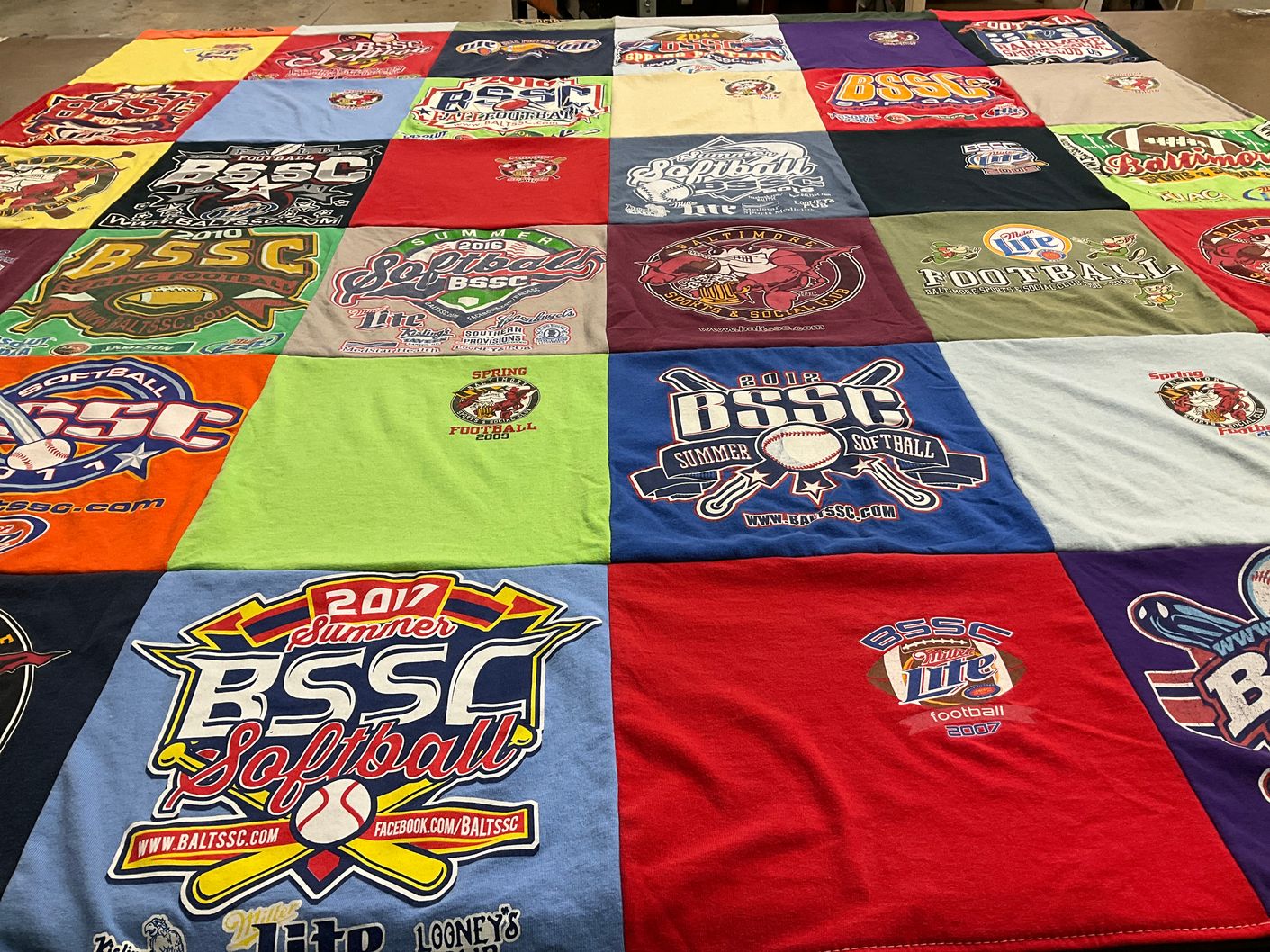 T-shirt quilt with softball, football themes by Tara from MD