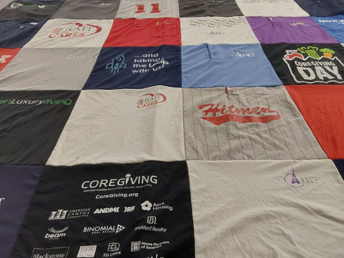 T-shirt quilt with community support, real estate themes by Lance from IL