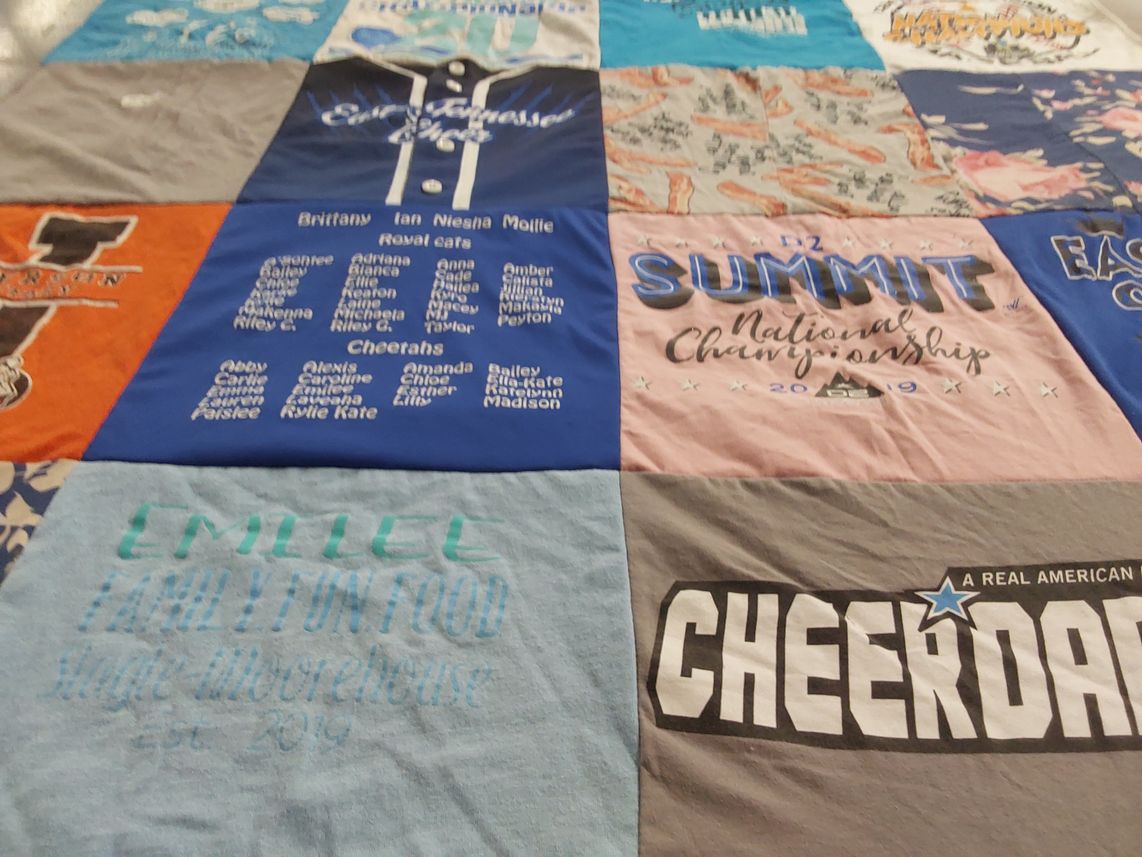T-shirt quilt with cheerleading, family activities themes by Sandra from TN