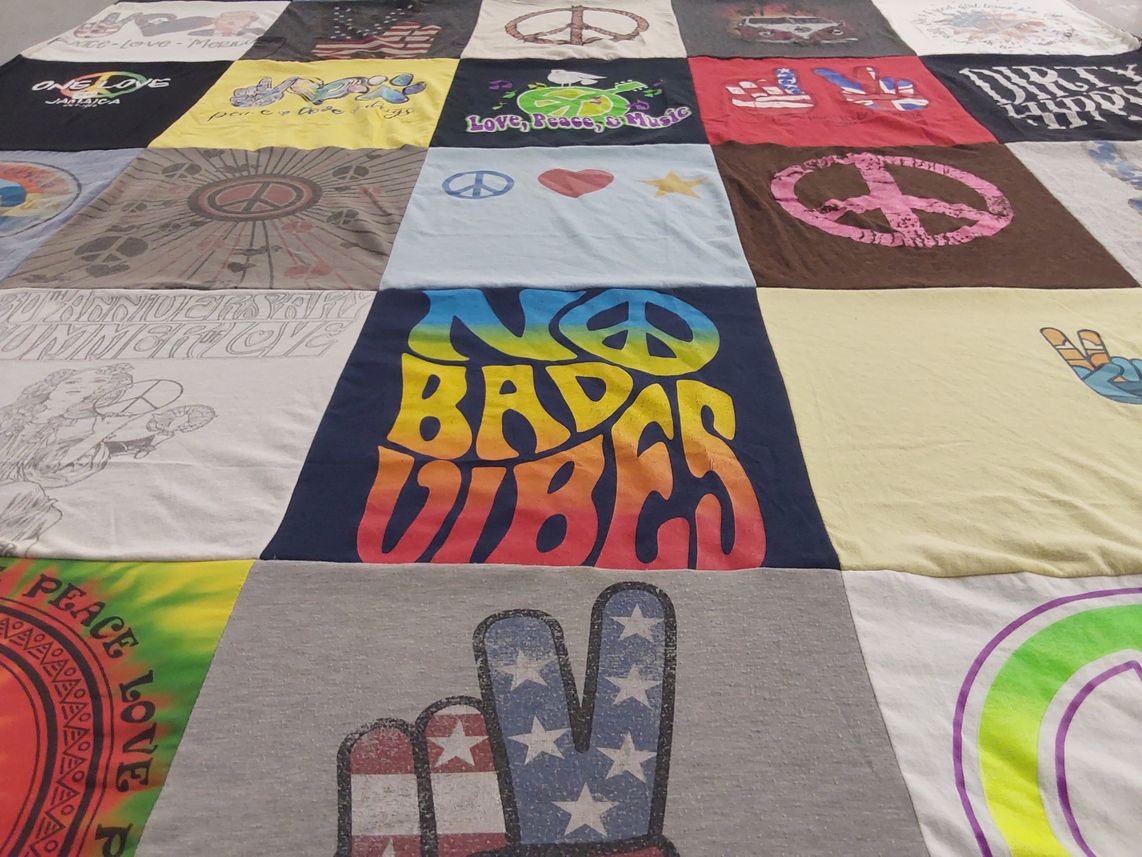 T-shirt quilt with music, happiness themes by Sanita from TX