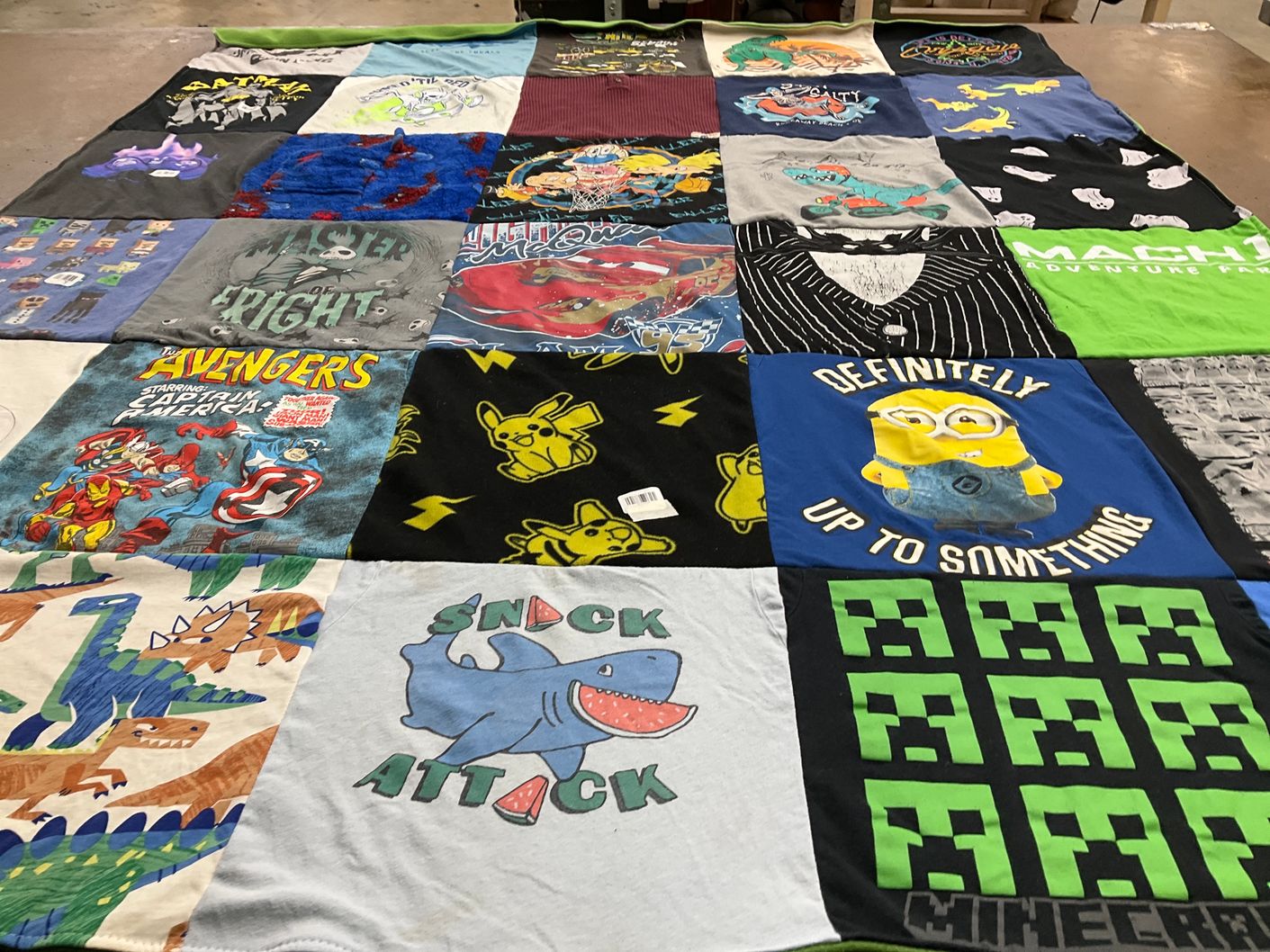 T-shirt quilt with superheroes, cartoons themes by Sonja from WA