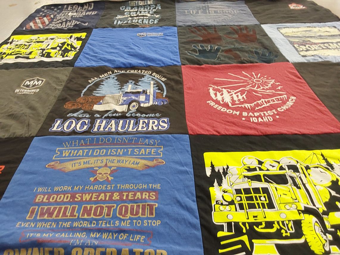T-shirt quilt with trucking, logging themes by Jennifer from OR