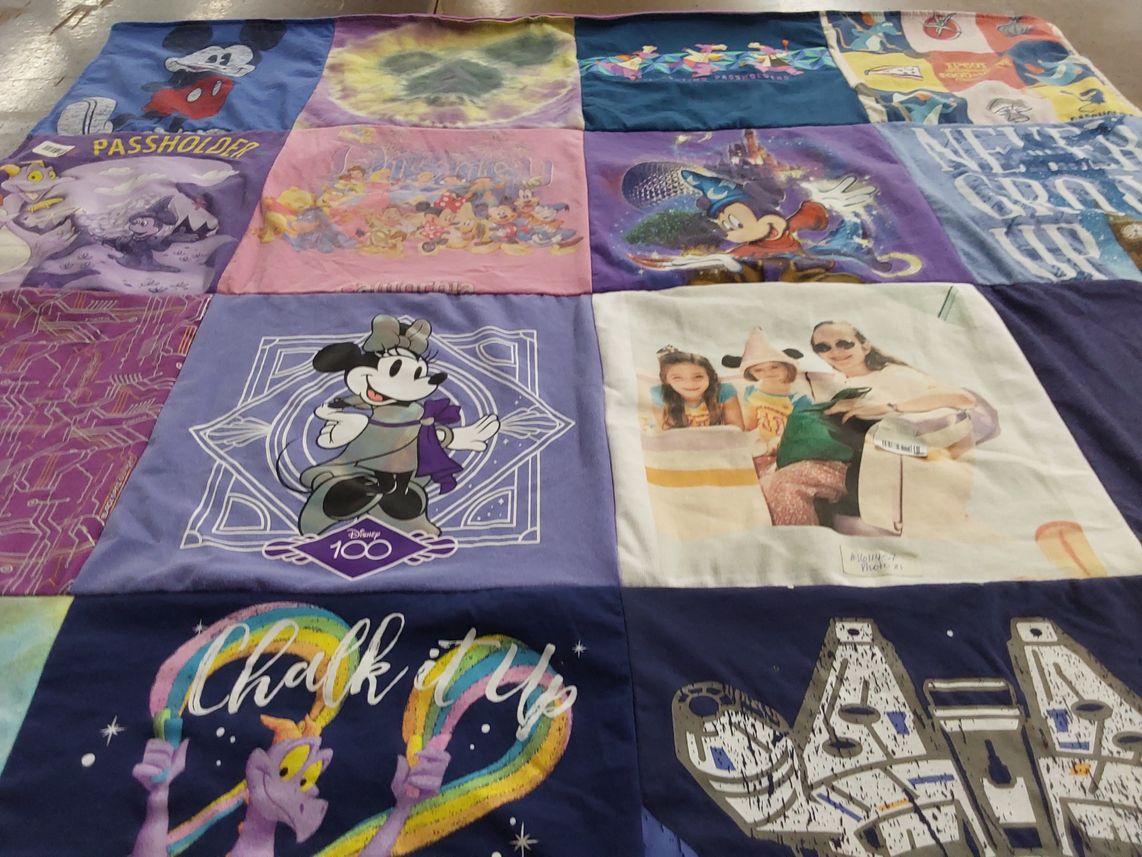 T-shirt quilt with disney, amusement parks themes by Renee from SC