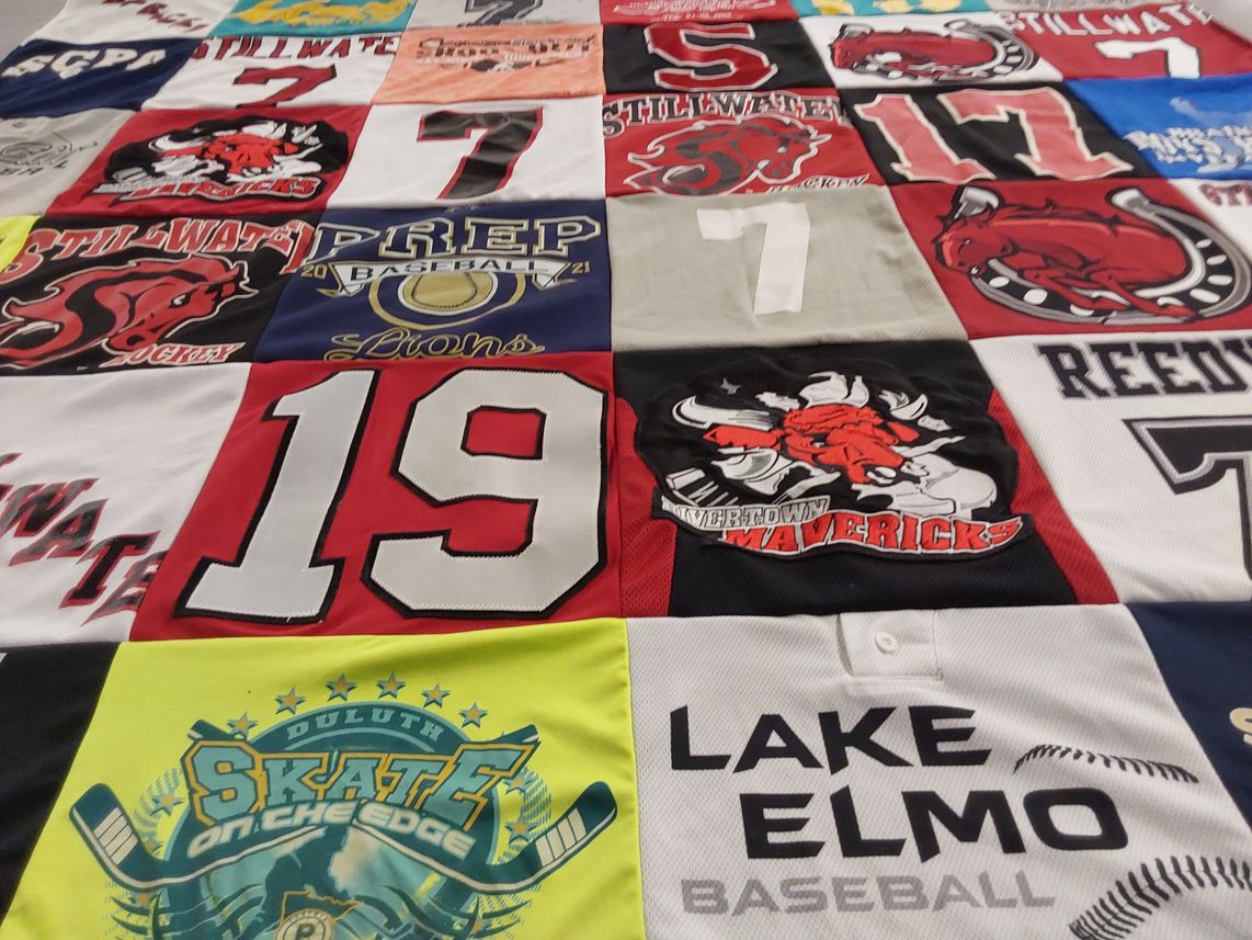 T-shirt quilt featuring stillwater area high school soccer, timberland mavericks by Jill from MN