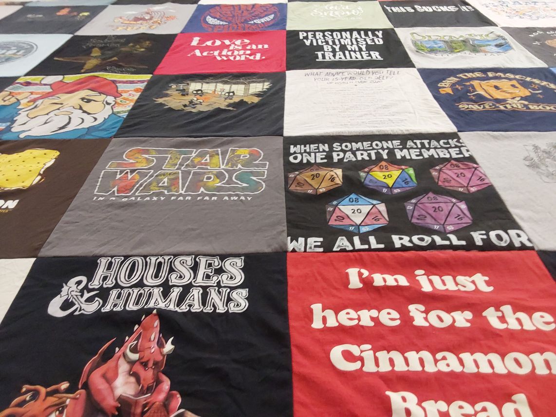 T-shirt quilt with gaming, dungeons and dragons themes by Nikki from OR