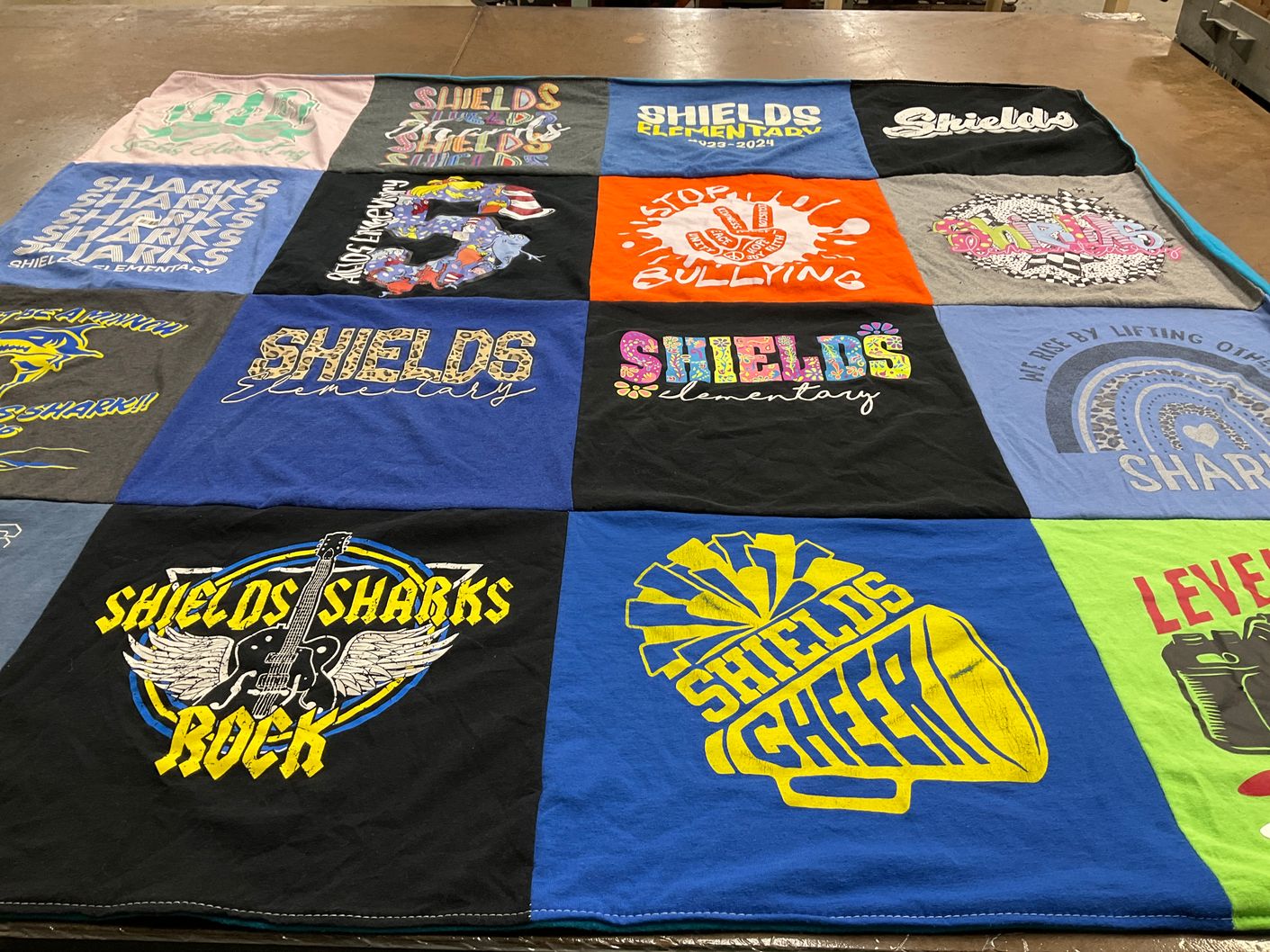 T-shirt quilt featuring shields sharks by Melissa from TX
