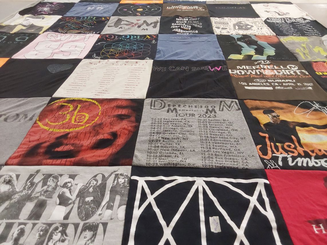 T-shirt quilt with music, concerts themes by Cheryl from CA