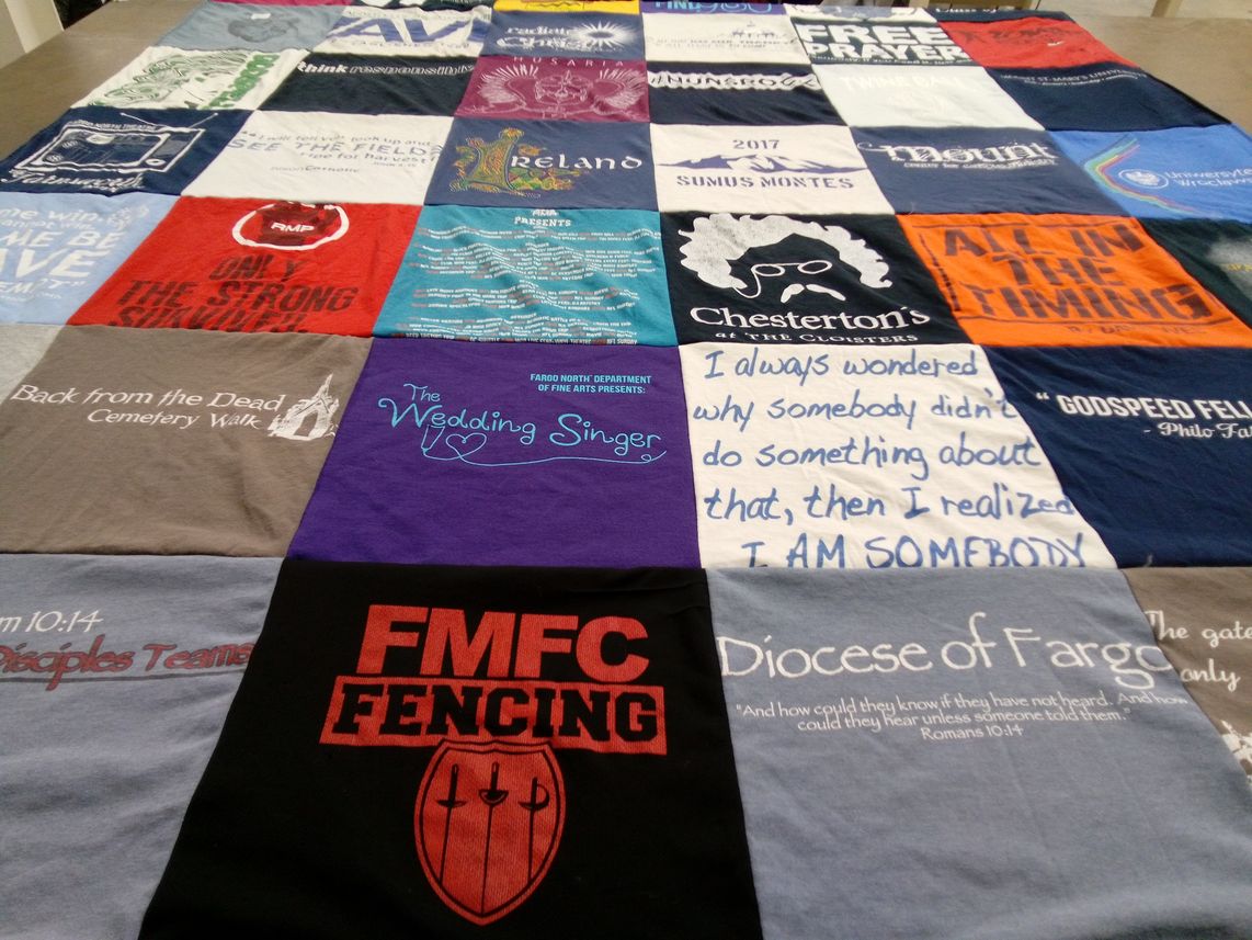 T-shirt quilt with theater, fencing themes by Bernadette from MN
