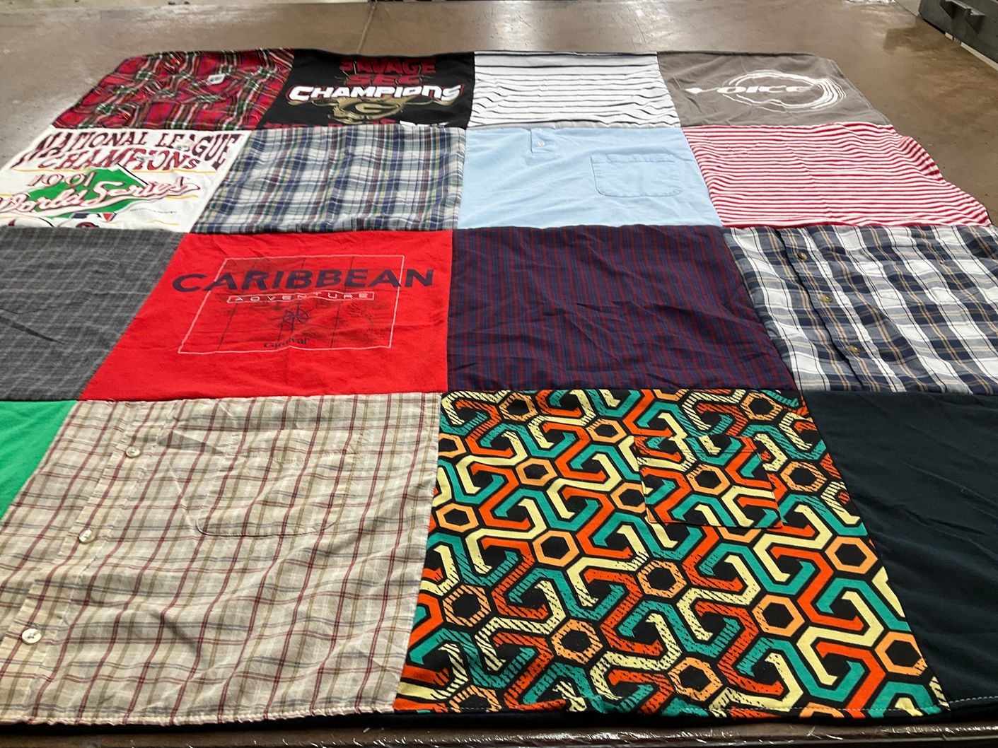 T-shirt quilt with travel, sports themes by Rosa from GA