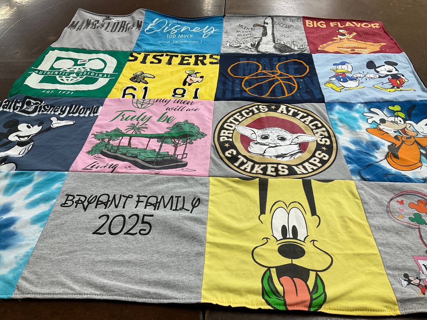 T-shirt quilt with disney, family themes by Diana from IN