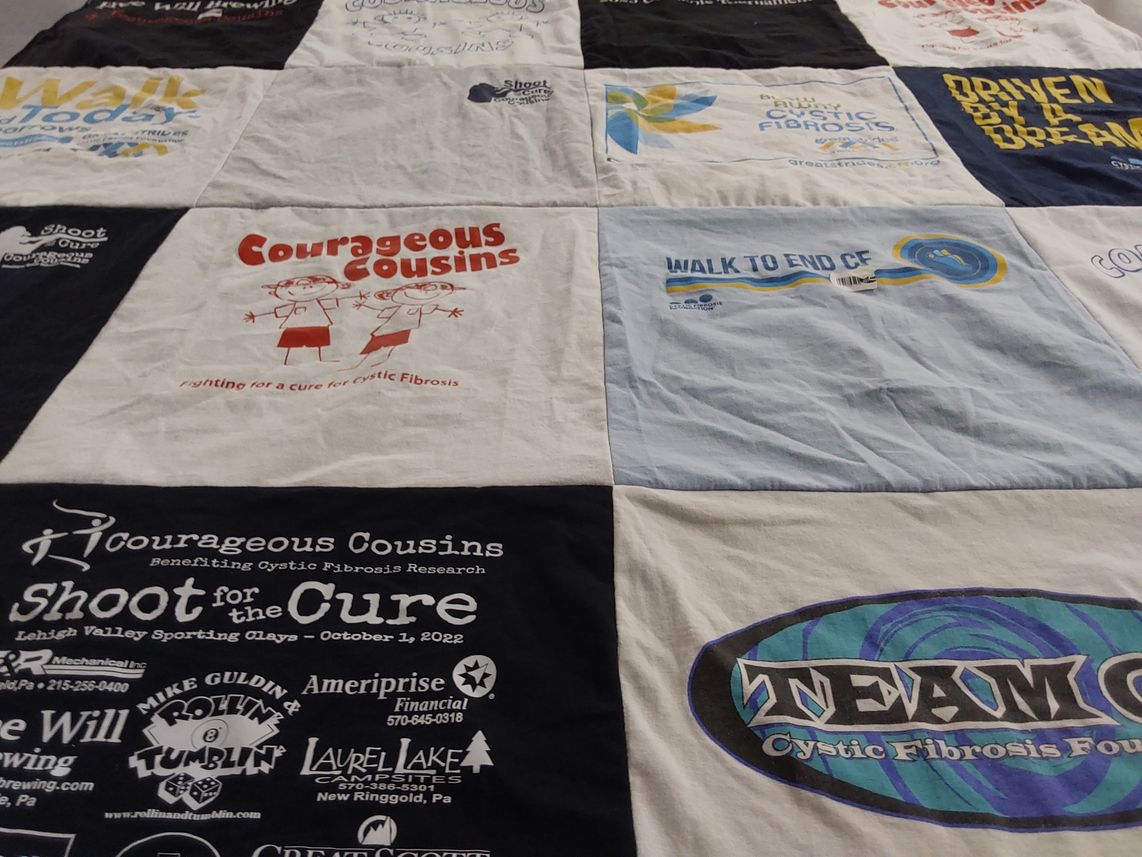 T-shirt quilt with cystic fibrosis awareness, fundraising themes by Linda from PA