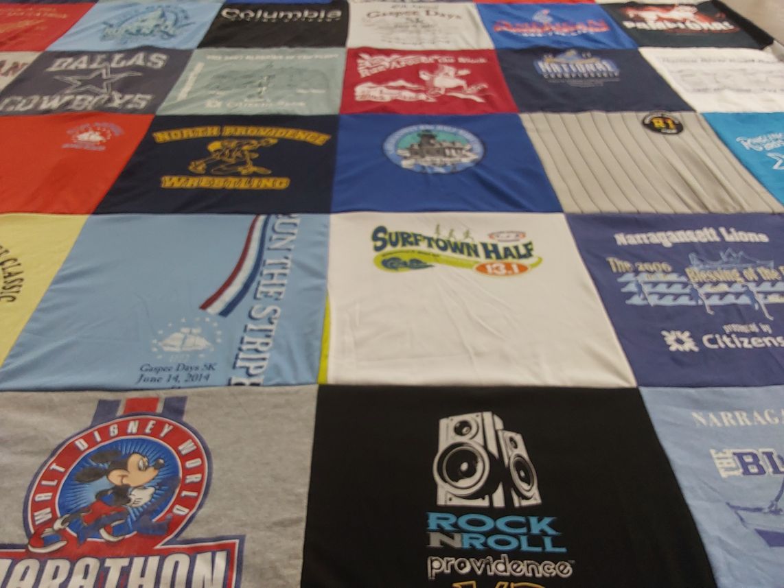 T-shirt quilt with running, sports themes by Eric from FL