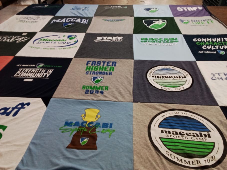 T-shirt quilt with sports, camping themes by Joel from AZ