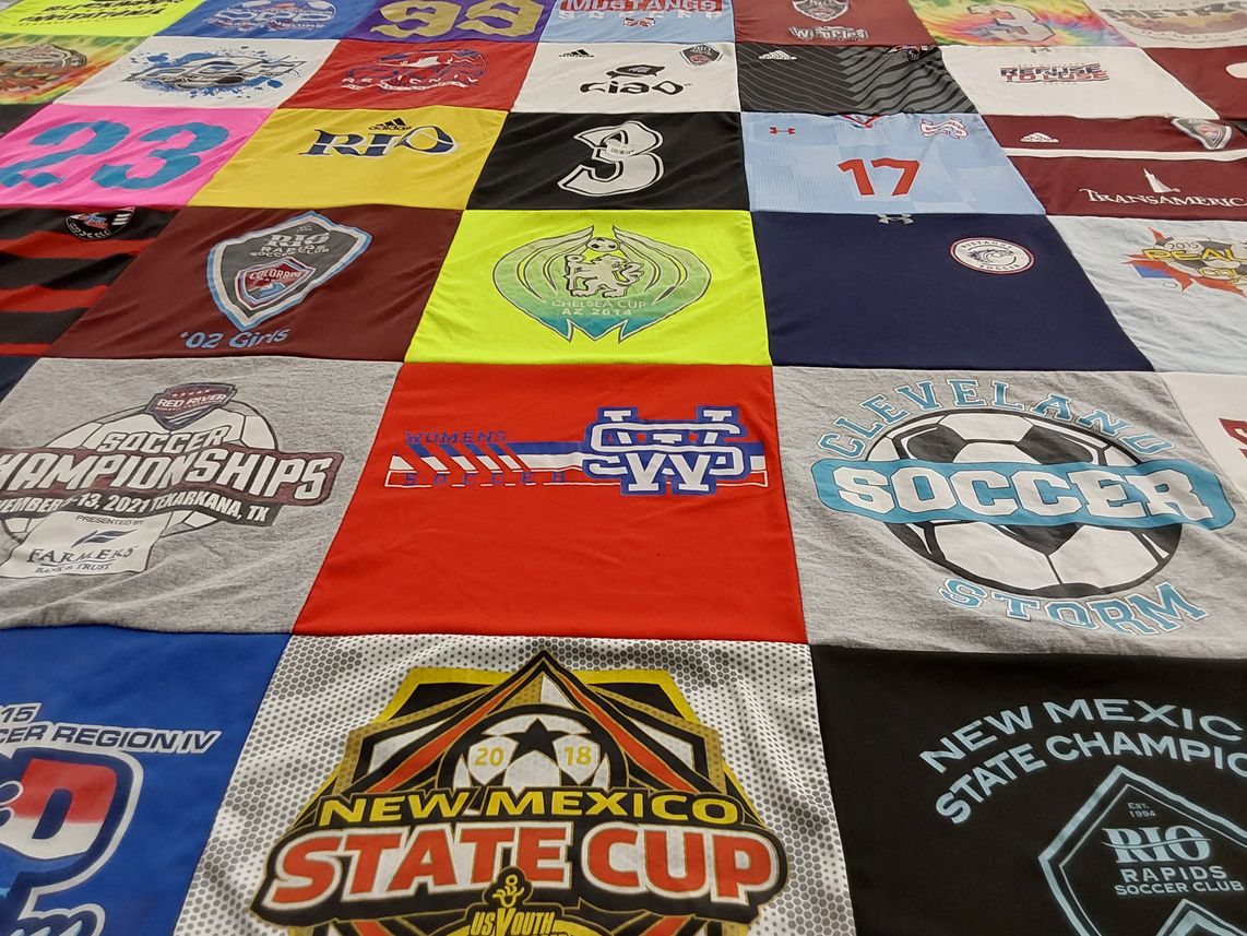T-shirt quilt with soccer, youth sports themes by Lianne from NM