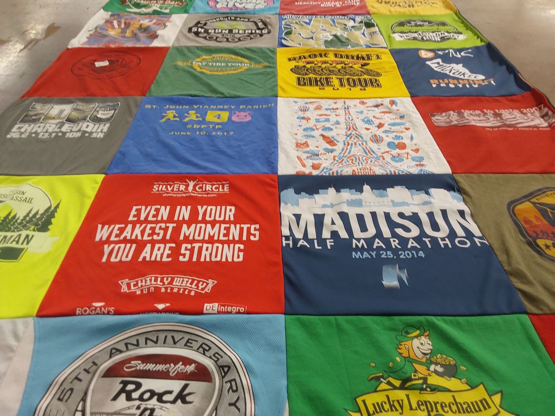 T-shirt quilt with running, events themes by Rebecca from WI